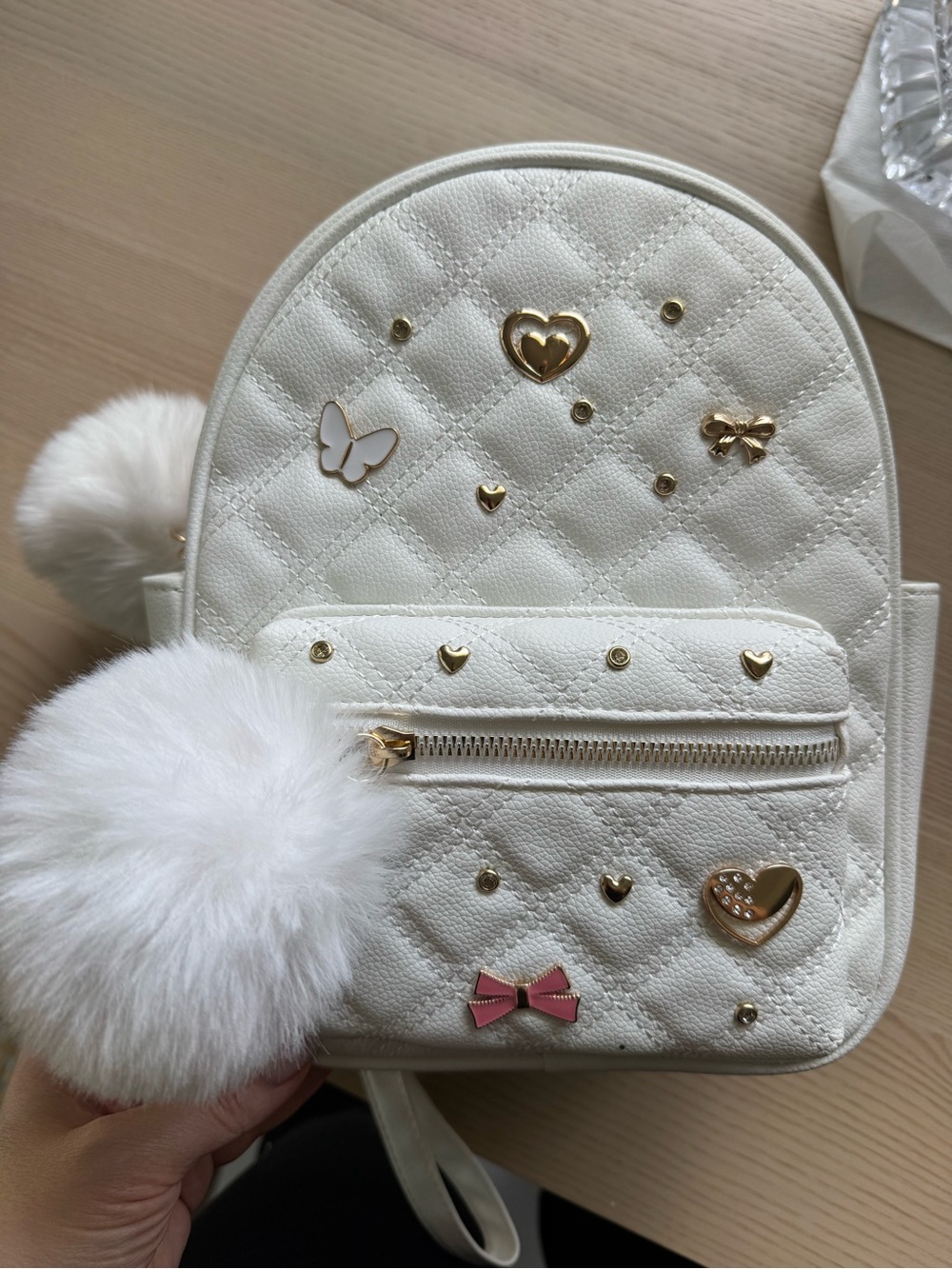 Under One Sky White Quilted Kids Backpack with Gold Accents and Pink Bow